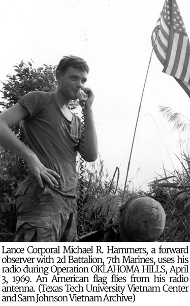 An American flag flies from Lance Corporal Michael R. Hammers's radio antenna.